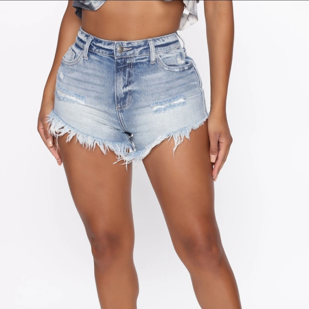 Light blue wash distressed denim jean shorts